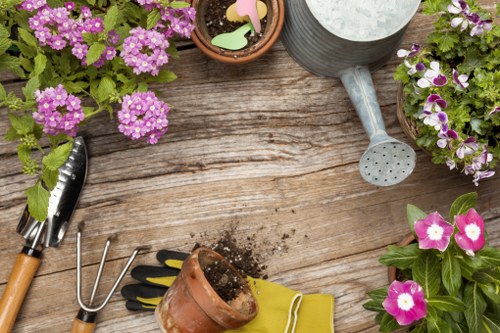 Landscape gardening in Perivale with a stylish patio and planting