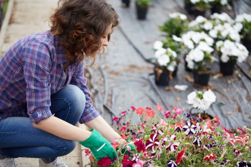 Gardening team preparing a service booking and paperwork